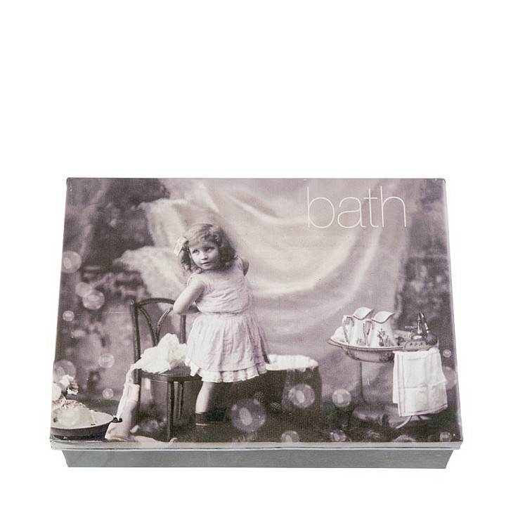 Tin box with little girl in the bathroom