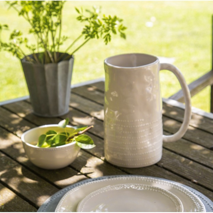 Cream porcelain pitcher with spotted edge d12,5 h21 cm