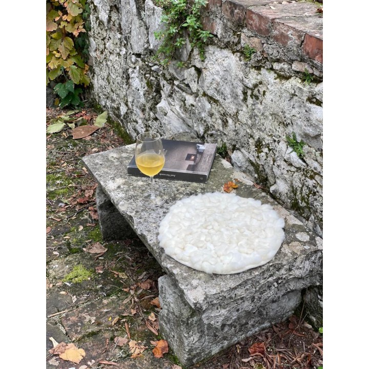 Felt cushion with sheep knots