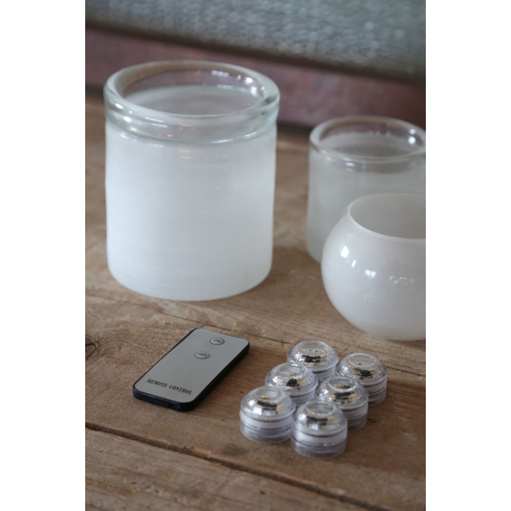 Set 6 lumieres impermeables avec batterie et telecommande d3 h2.5 cm