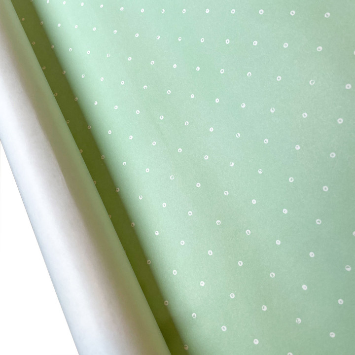 Light green paper sheet with white pois 70x100 cm