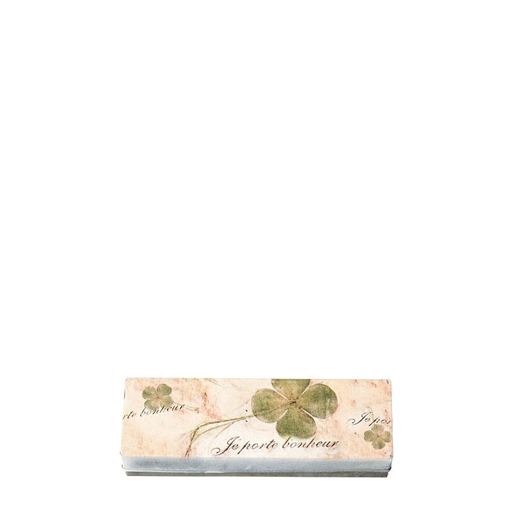 Tin box with inscription i bring luck four-leaf clover