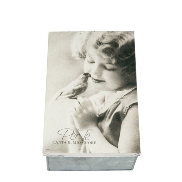 Tin box with little girl and bird
